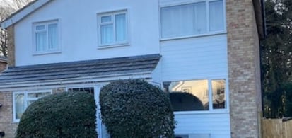 Modern detached home with outdoor heat pump